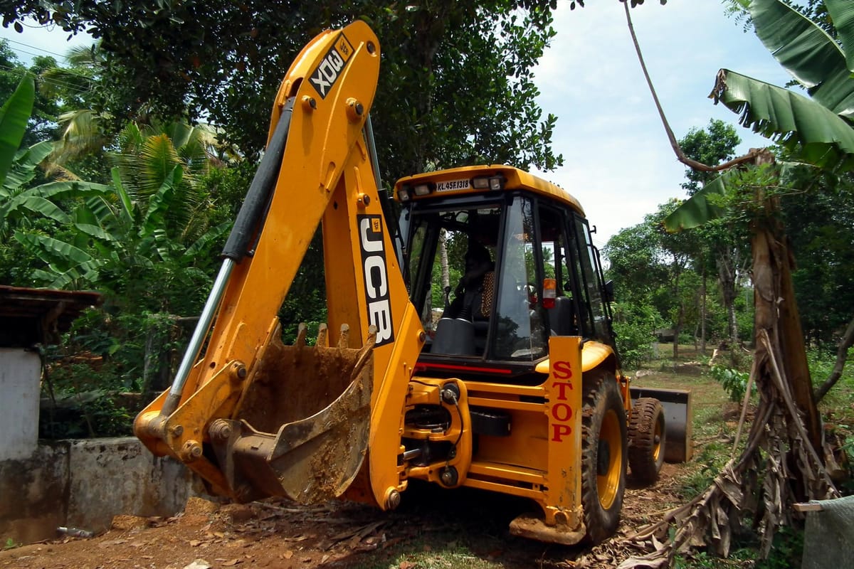 JCB machine working at a construction site in Uttar Pradesh
